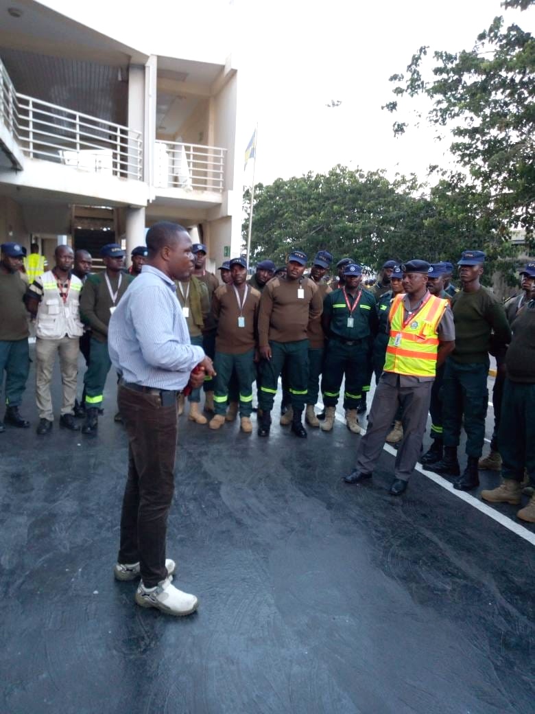 Security personnel gathered for a briefing